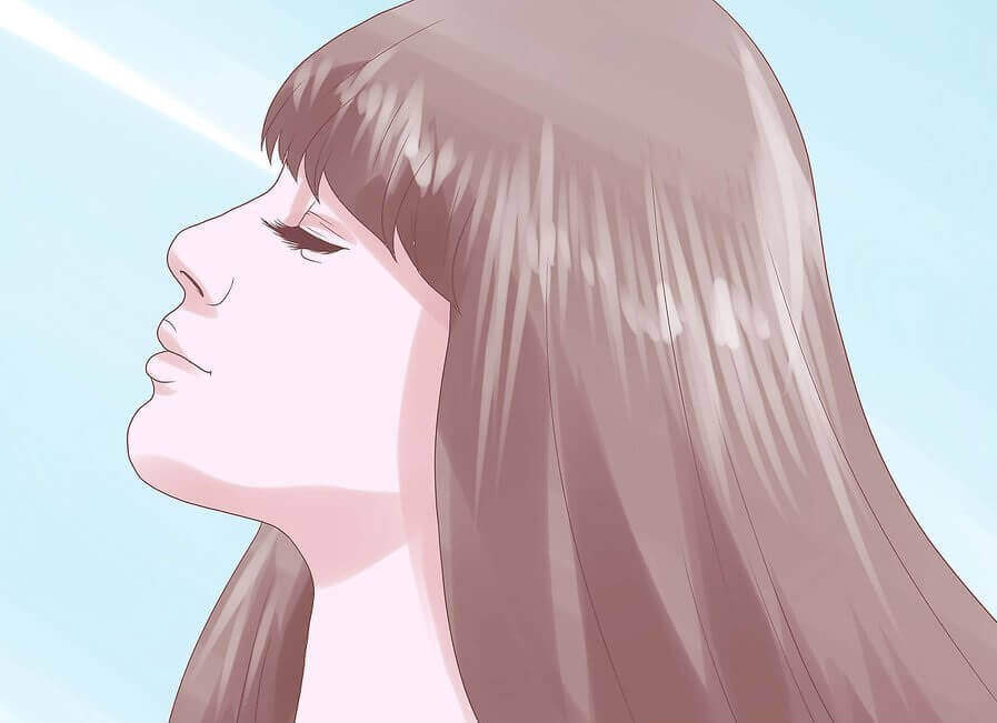 Twarz kobiety z długimi włosami