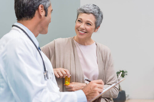 Kobieta w okresie menopauzy u lekarza